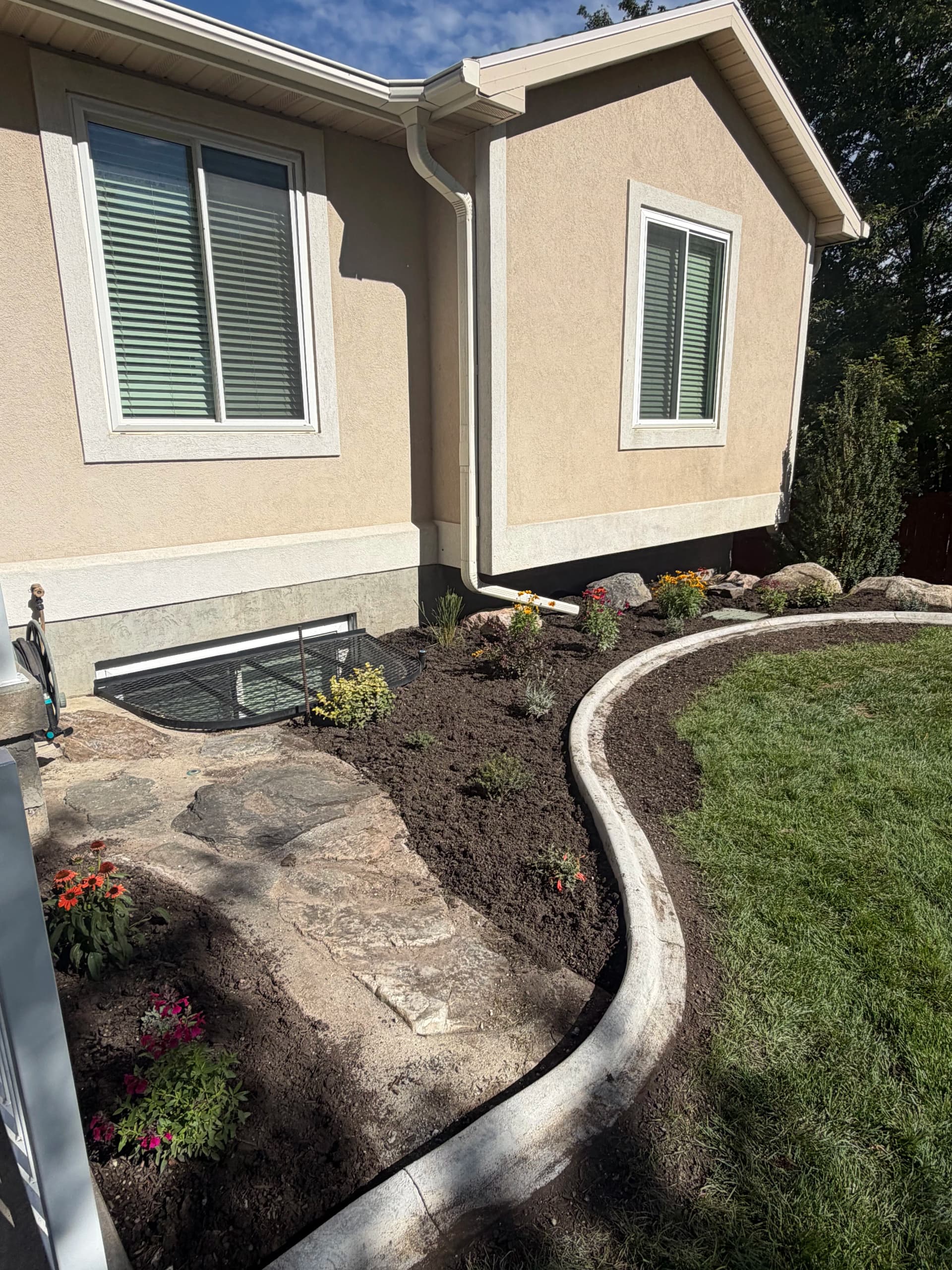 Flower Bed Redos That Make Your Home Look Sharp Again image