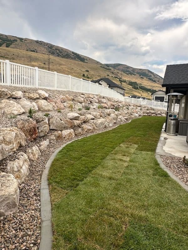 Gallery photos for Backyard Transformation with Fresh Sod and Retaining Walls: Image #1