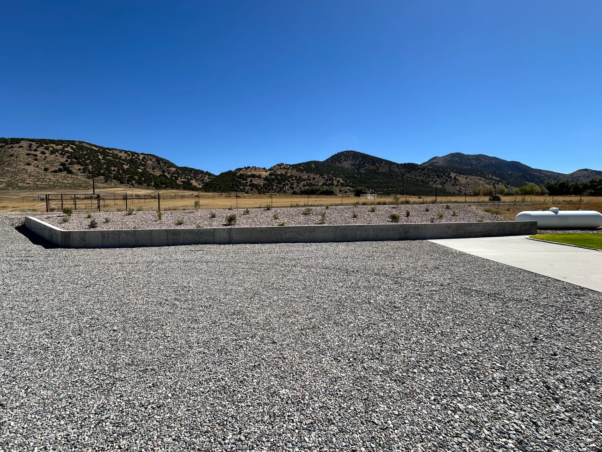 Gallery photos for Xeriscape Expansion with New Shrubs, Gravel, and Drip Irrigation: Image #1