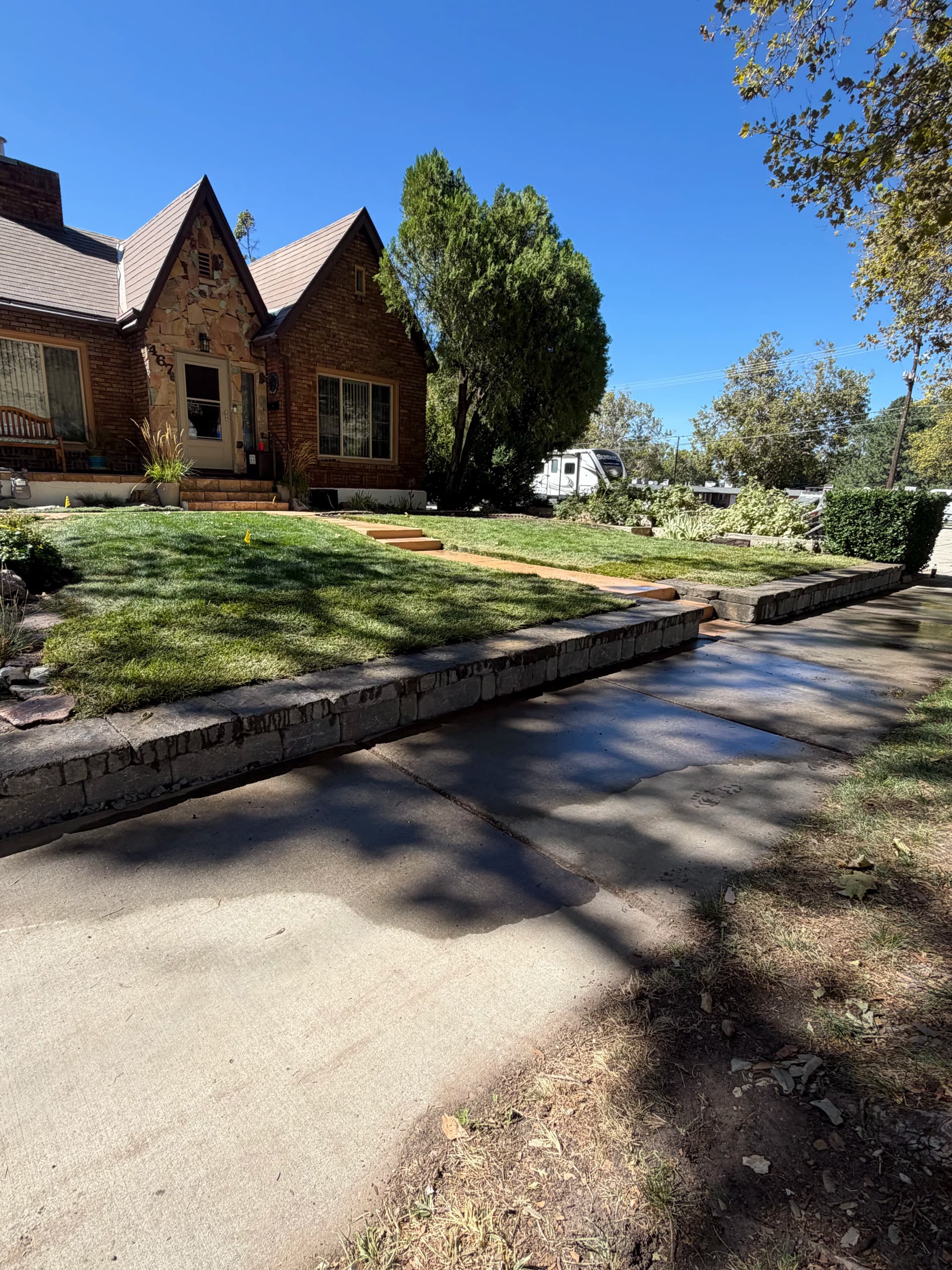 Gallery photos for Block Wall and Sod Turn a Sloped Front Yard Into Usable Space: Image #1