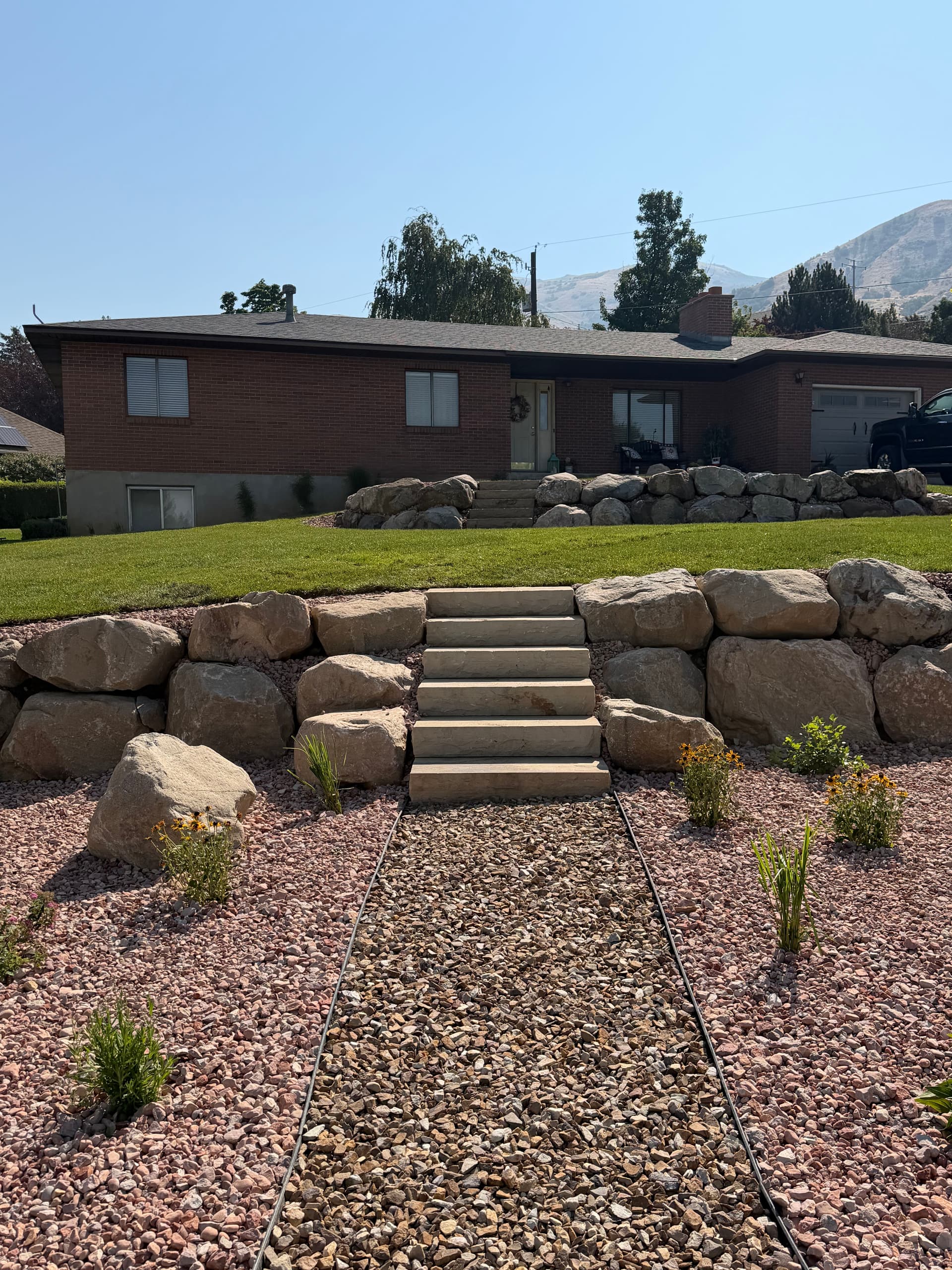 Gallery photos for Sloped Front Yard Turned Usable Space in Perry Utah: Image #1